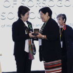 Sorsogon Mayor Hon. Sally Lee receives the Performance Governance System Initiation medallion from ISA President and Vice Chairperson Ms. Maria Lourdes Fernando.